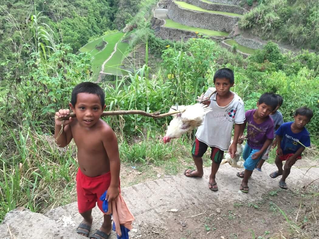 Local kids on the trail to Whang Od