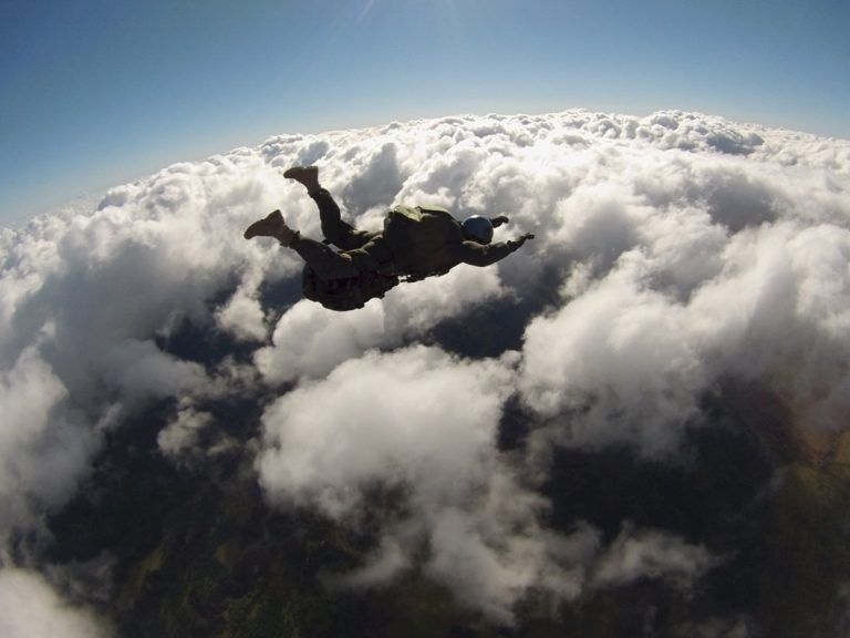 skydiving above the clouds