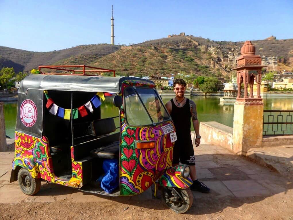 will standing with his psychedelic rickshaw after crossing the wagah border from india