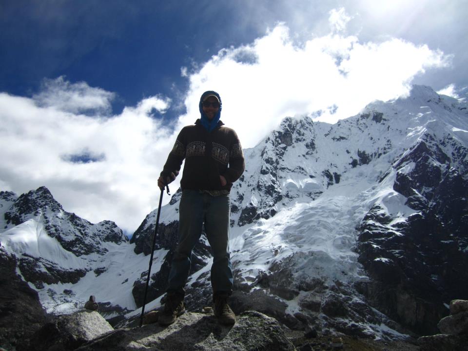 Person trekking to the top of the Andes.
