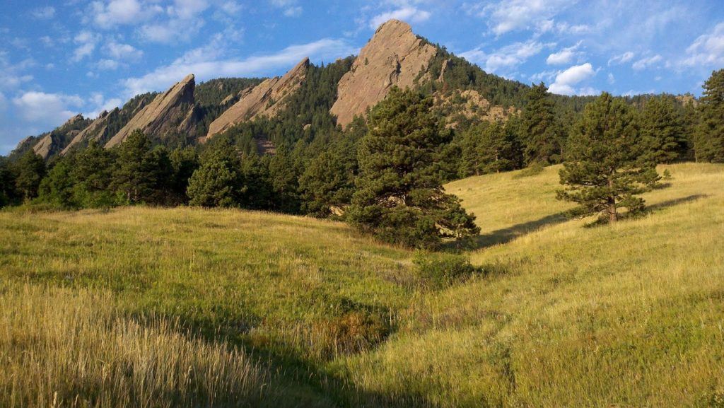 flatirons in boulder colorado on a  blue sky day