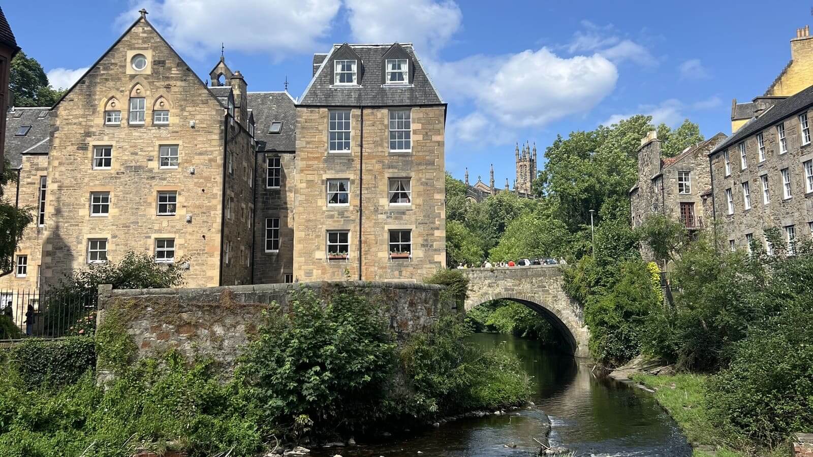 houses on a river in dean village, edinburgh