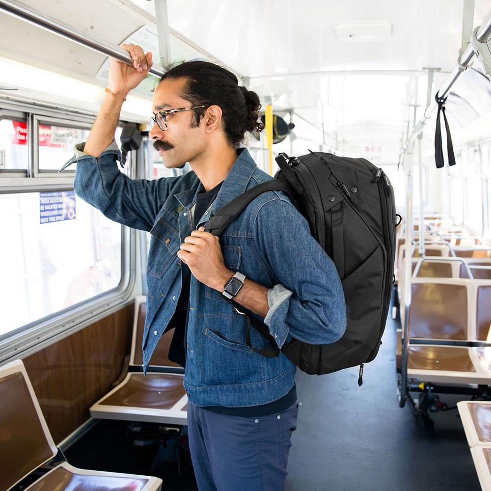 wearing peak design 45 L travel backpack review