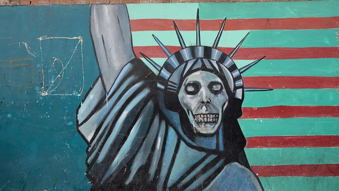 USA flag with skull replacing statue of liberty