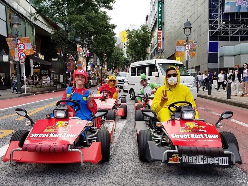 Travellers in Tokyo doing a fun go-kart tour activity