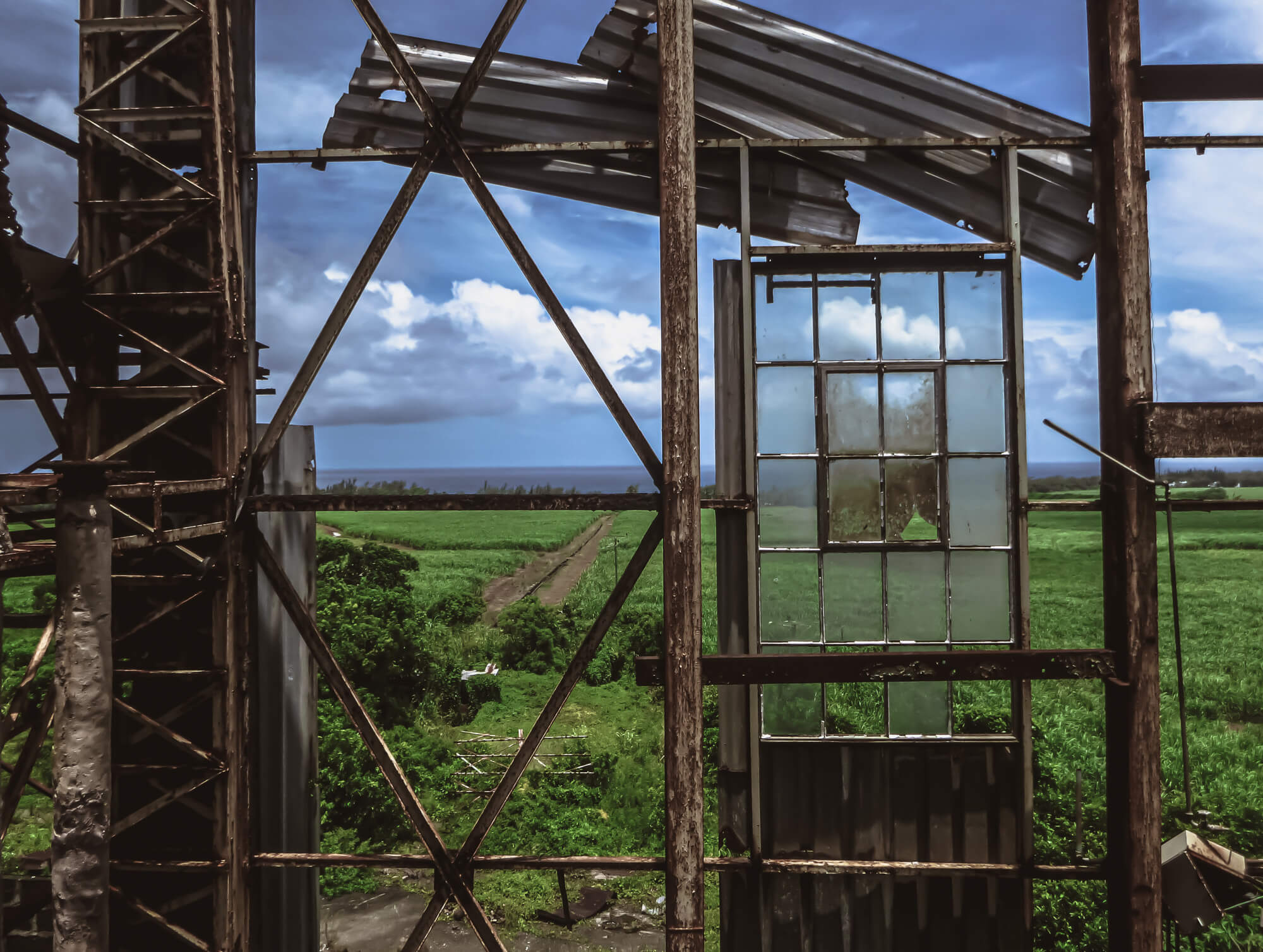Climbing a rusty factory of questionable safety in Mauritius