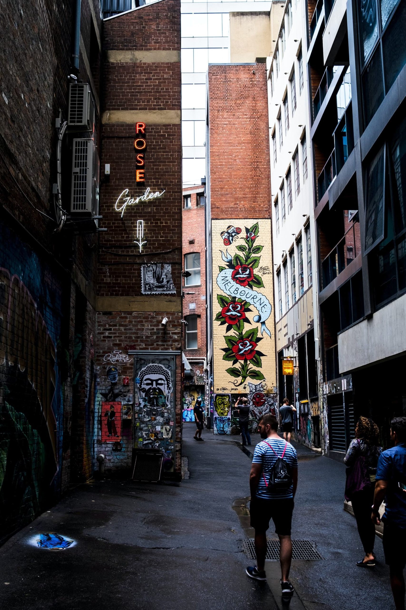 Famous laneway in Melbourne filled with Australians enjoying recreational activities