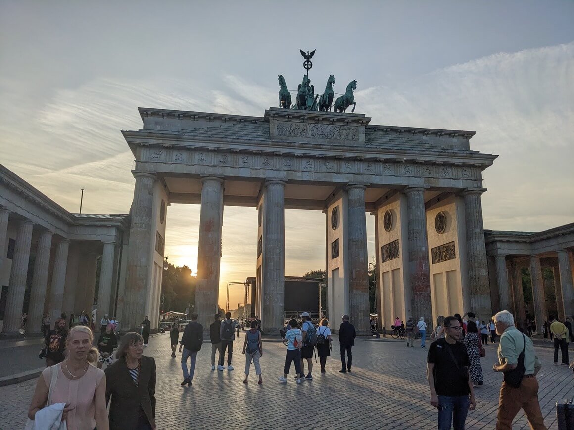 Brandenburg Gate in Berlin with sunset behind