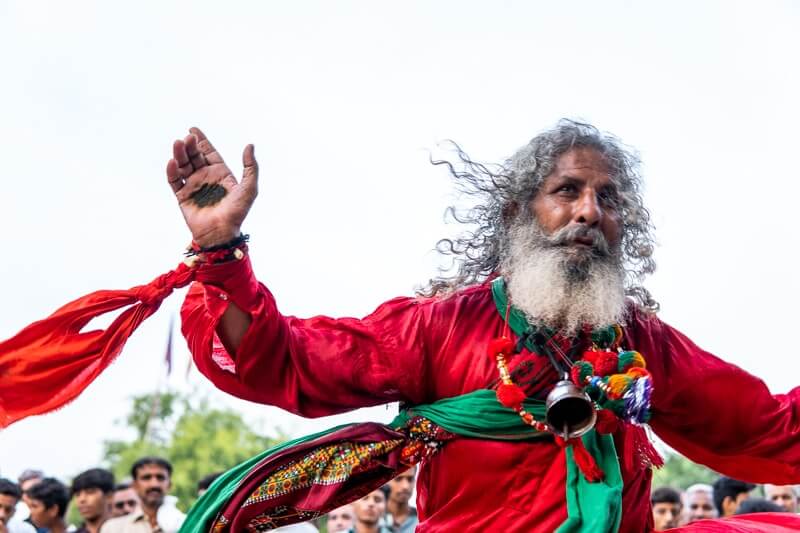 man dancing at sufi festival in pakistan