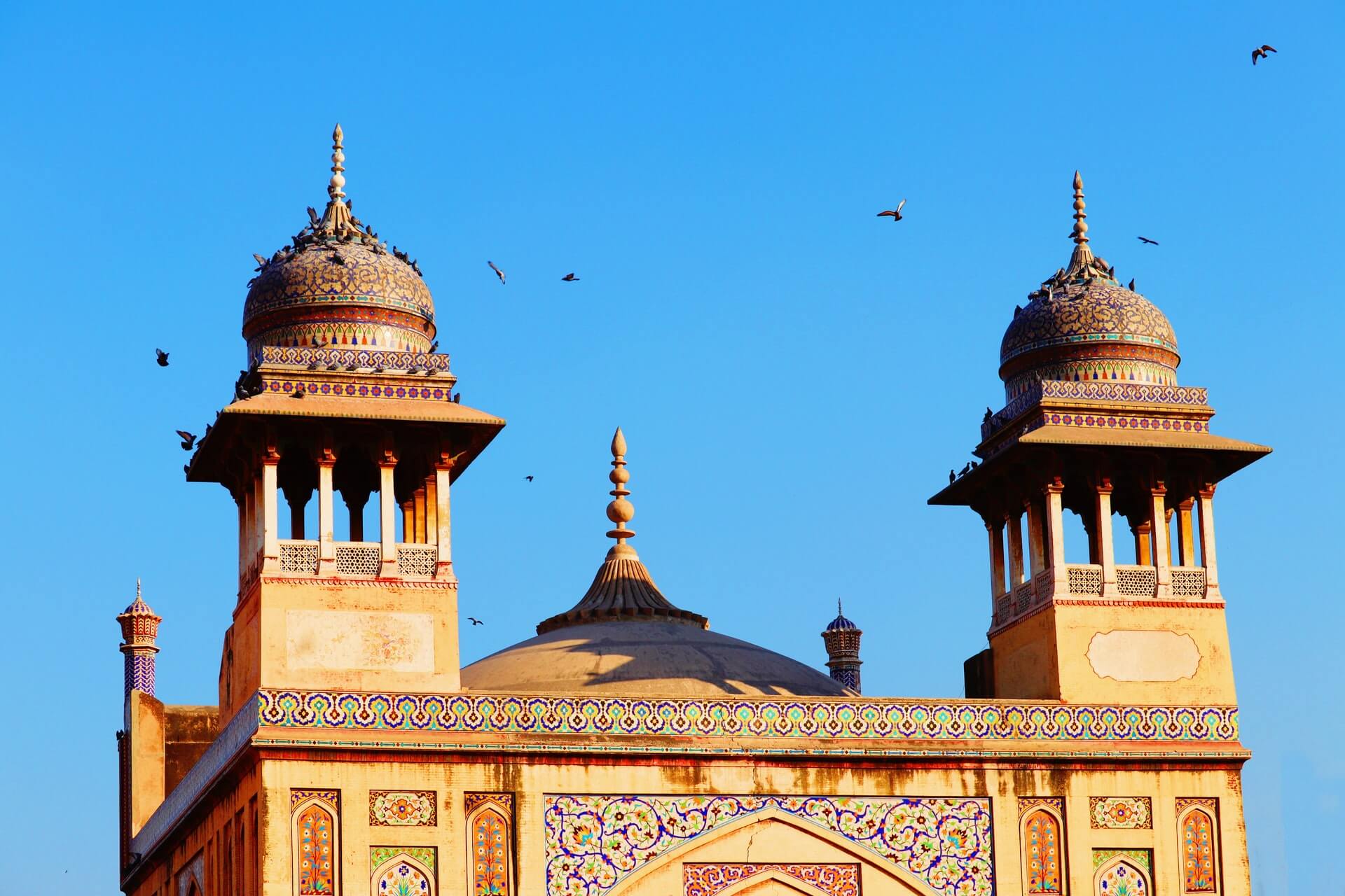 shot of the colorful details of the wazir khan masjid in lahore reasons to travel to pakistan