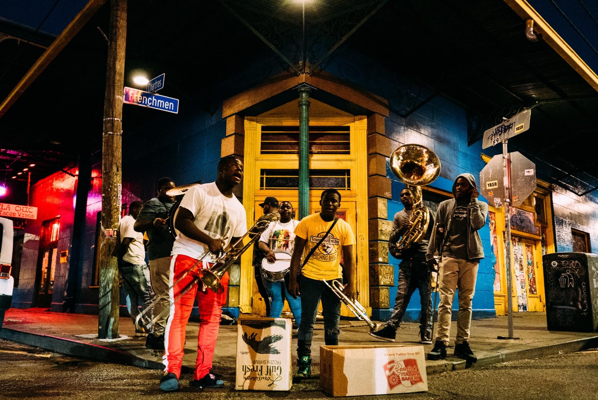 guys playing jazz instrument at night at a place in new orleans travel guide