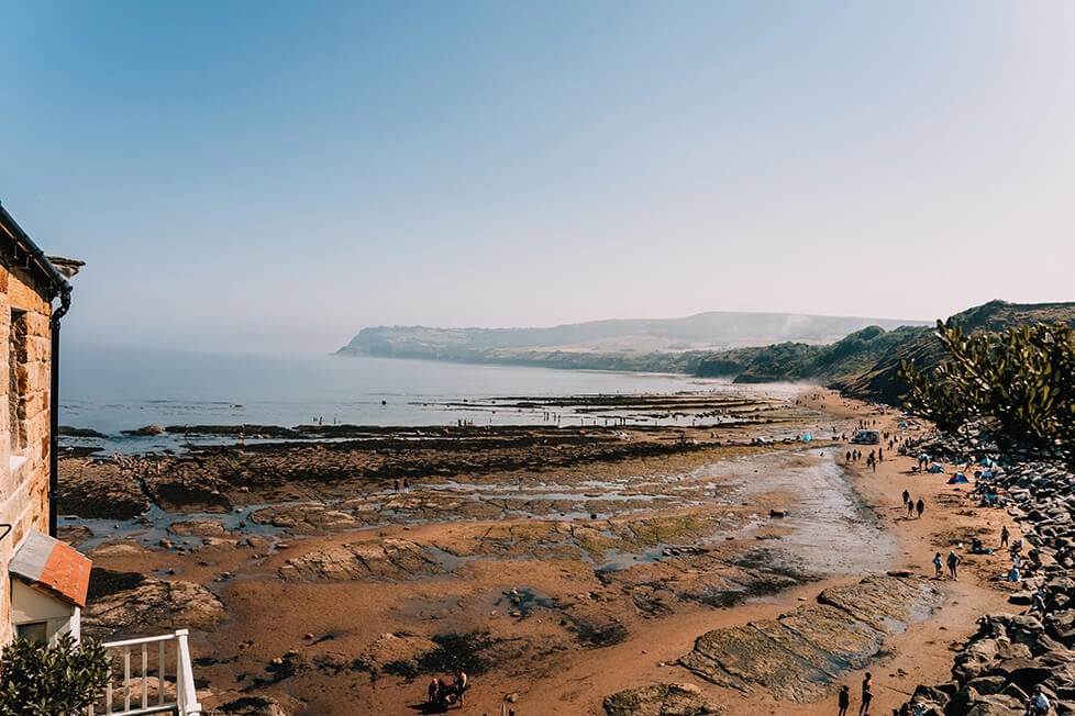 The coastline of the UK with a rolling sea fog