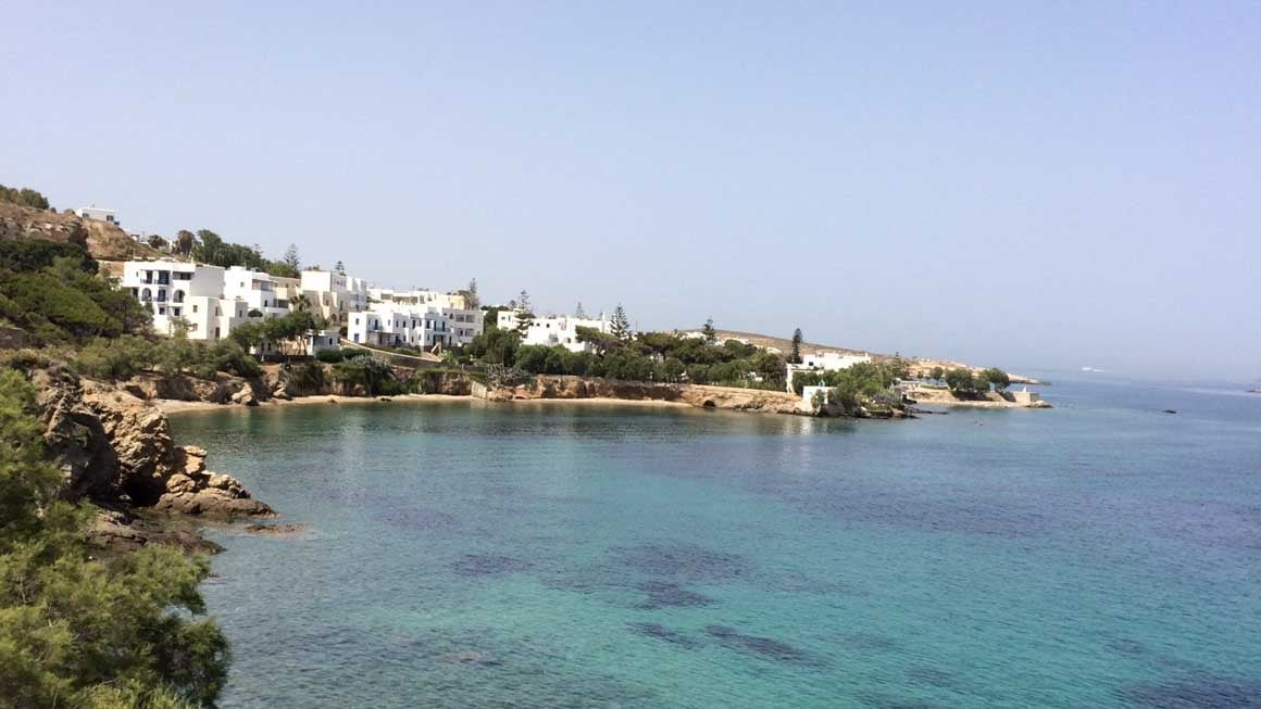 A landscape image of a bay with crystal clear waters in Tigaki, Kos