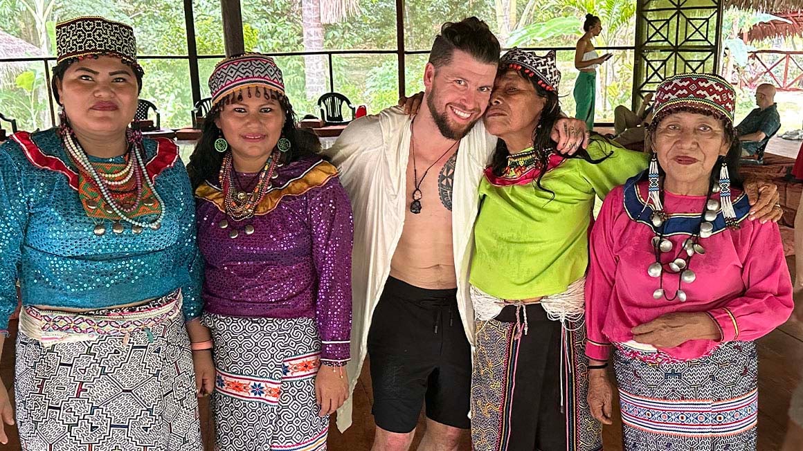 Will stood with four of the maestras in traditional Amazonian clothing