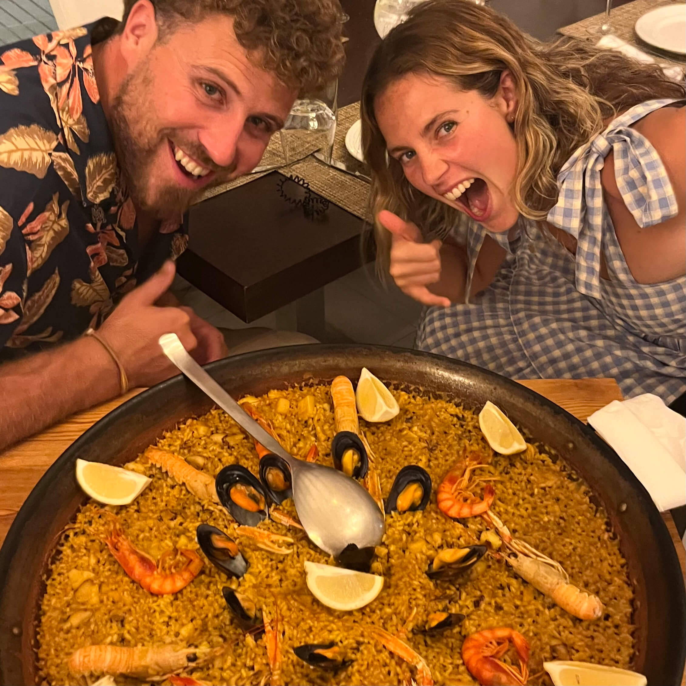Two very exciting travelled about to try Seafood Paella in Spain