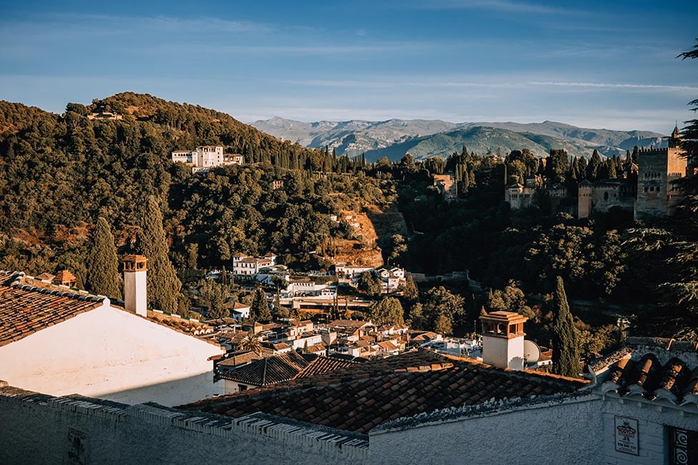 The view of the town and mountains beyond in Granada, Spain