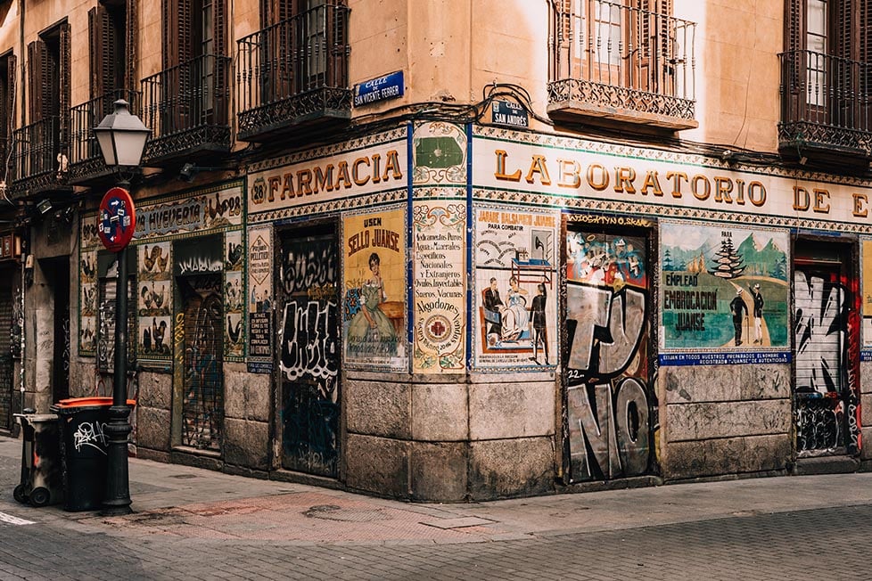 An old ornate pharmacy in Madrid, Spain covered in tiles