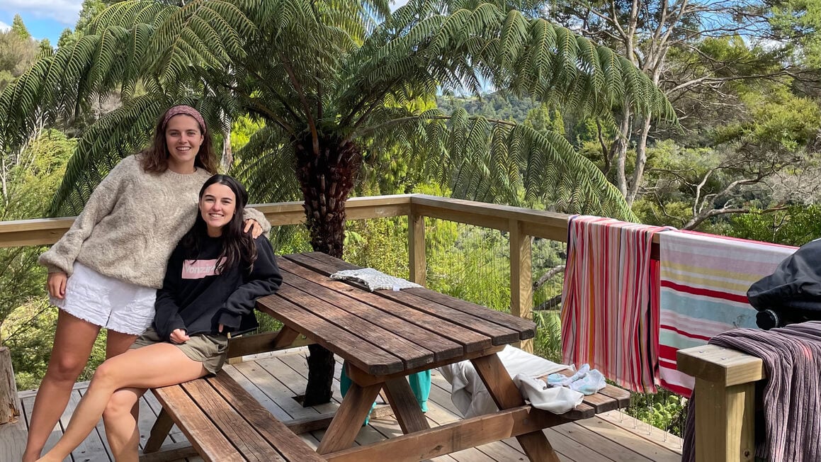 dani and friend at a cabin in the woods in New Zealand