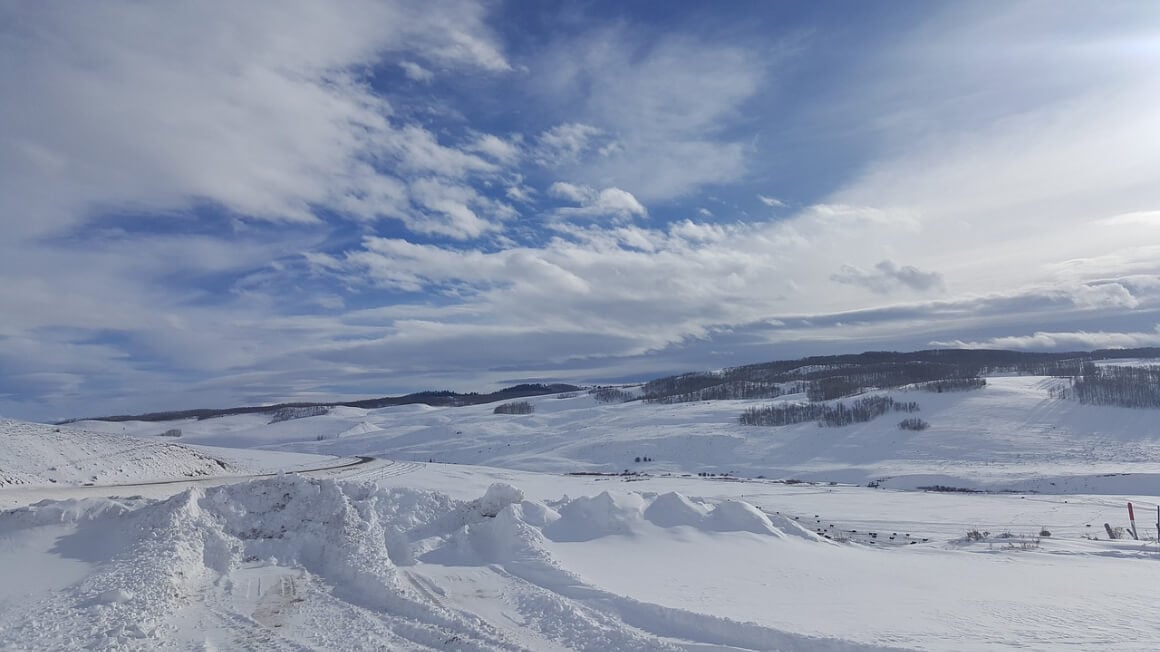 A snowy landscape on a bright clear day in Steamboat Springs.