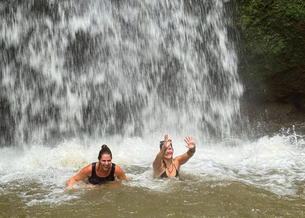 Dani and Samantha in Tibumana waterfall in Ubud.
