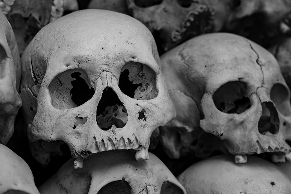 Skulls at the Killing Fields near Phnom Penh from the Khmer Rouge genocide by Pol Pot.