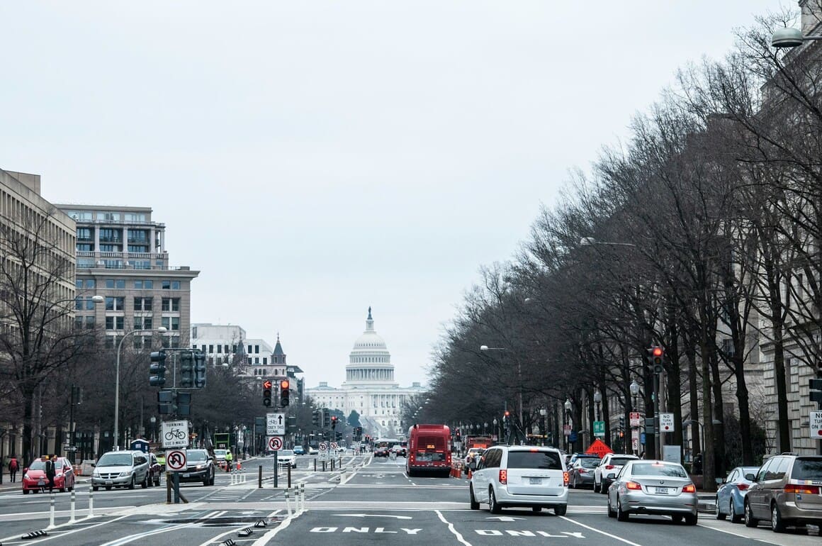 vehicles on a road leading down to the capitol, washington dc