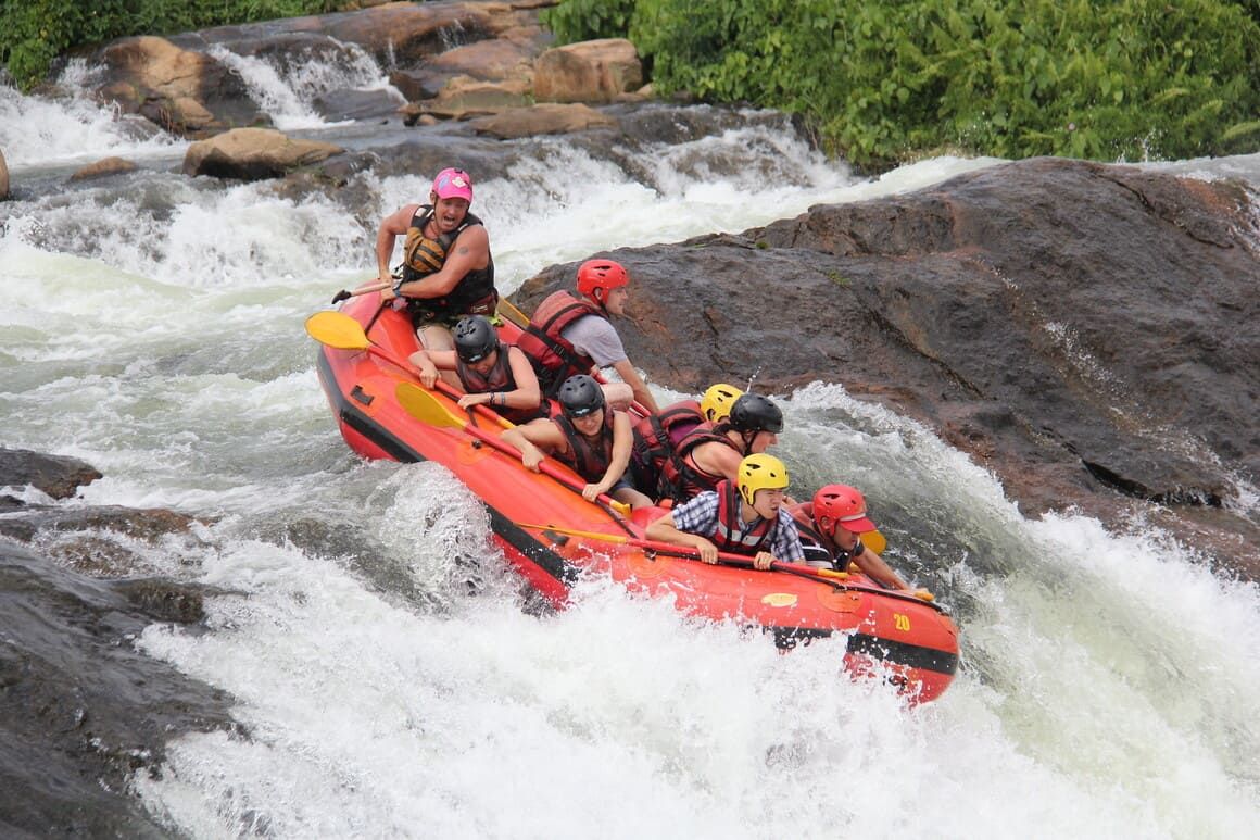 tourists going river rafting in jinja one of the best things to do in uganda