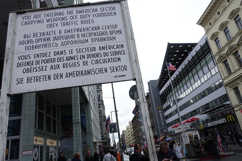 A sign in three languages at Checkpoint Charlie in Berlin