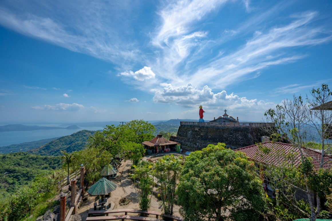 Tagaytay Highland Philippines, view across a cafe lookout, mountains and the sea in the background