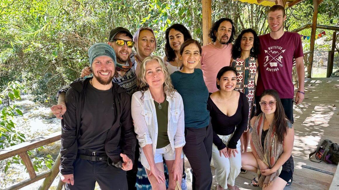 Will and Alex with a group of people whilst on a tour in Ecuador