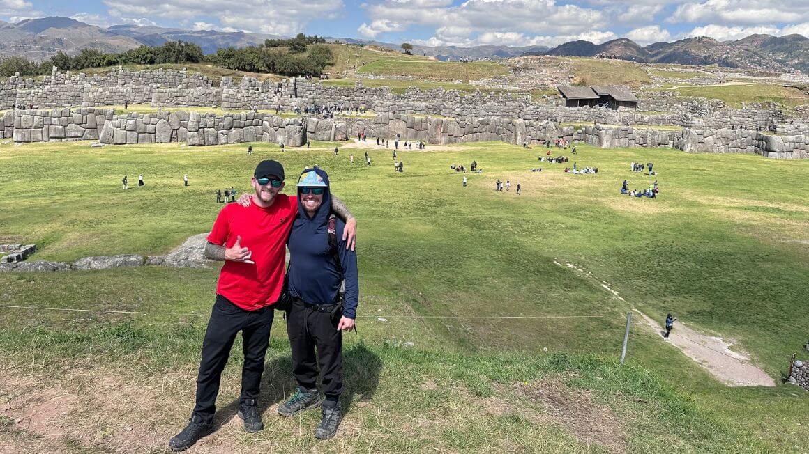 Will and his brother Alex standing in front of the ruins along the inca trail in Peru