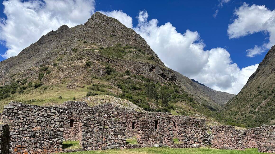 A mountain with inca ruins at its base in Peru on the inca trail.