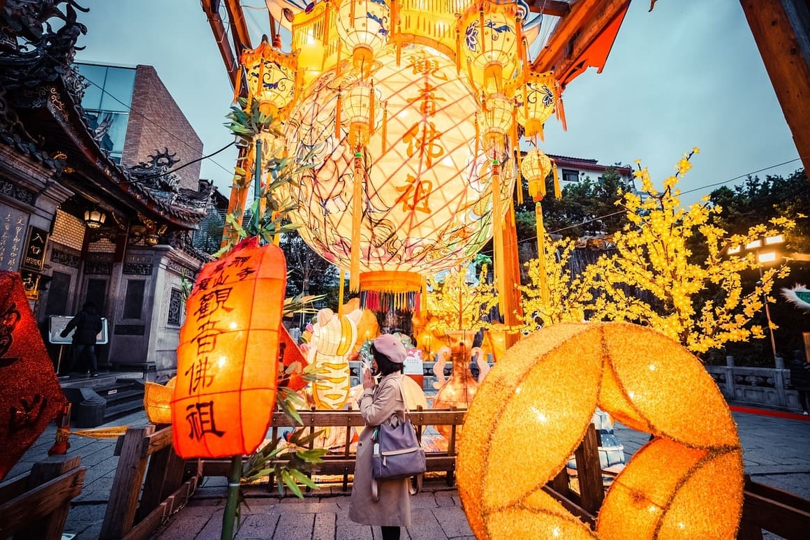 lanterns surrounded by traditional architecture in taipei