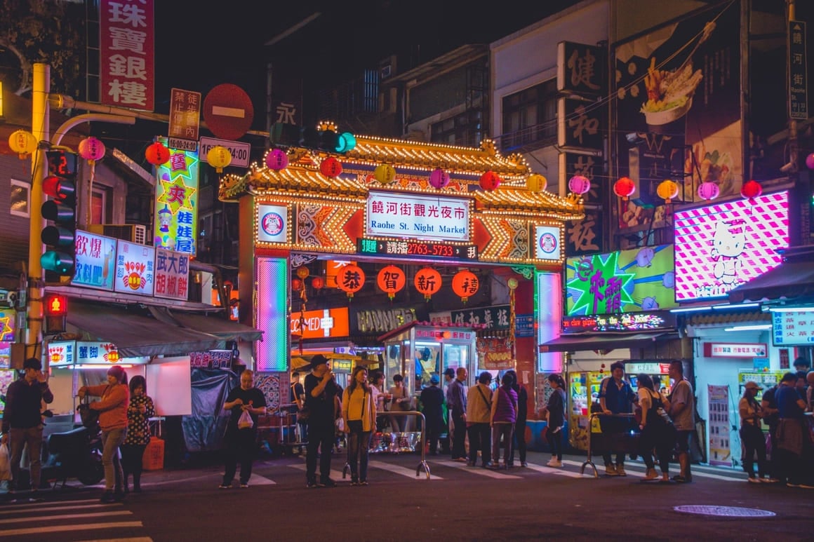 neon lights of night market in taipei