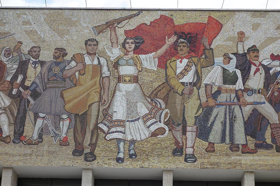 A mosaic mural on the side of the museum in Tirana, Albania in typical communist style.