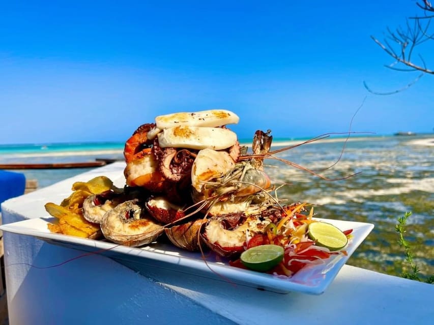 Fresh Seafood Platterat The Rock Restaurant with the beach and sea in the background