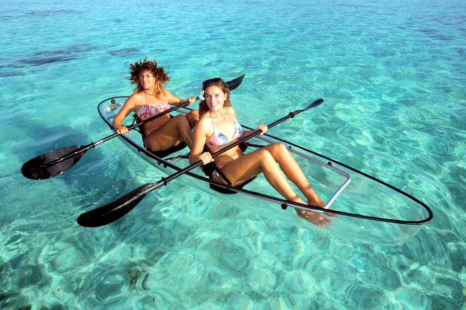 Two girls in a The Nungwi Kendwa Waters on a Transparent Kayak