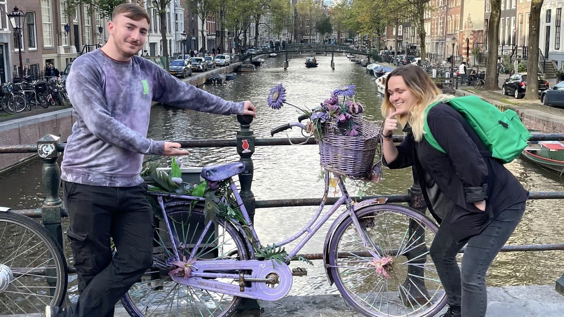 bikes on a canal in amsterdam