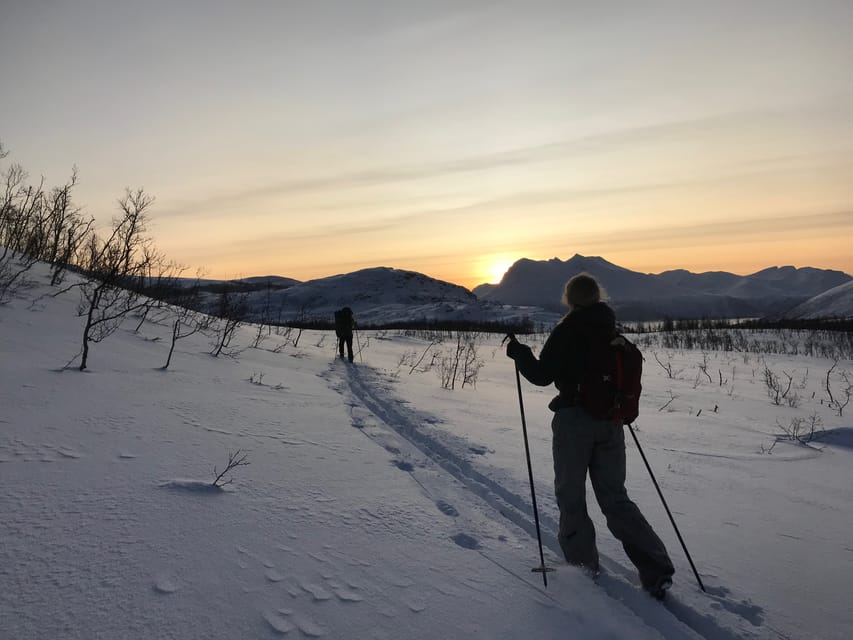 two people Head out cross country skiing while at a utah ski resort around sunset