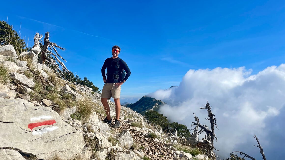 harvey climbing a mountain in albania