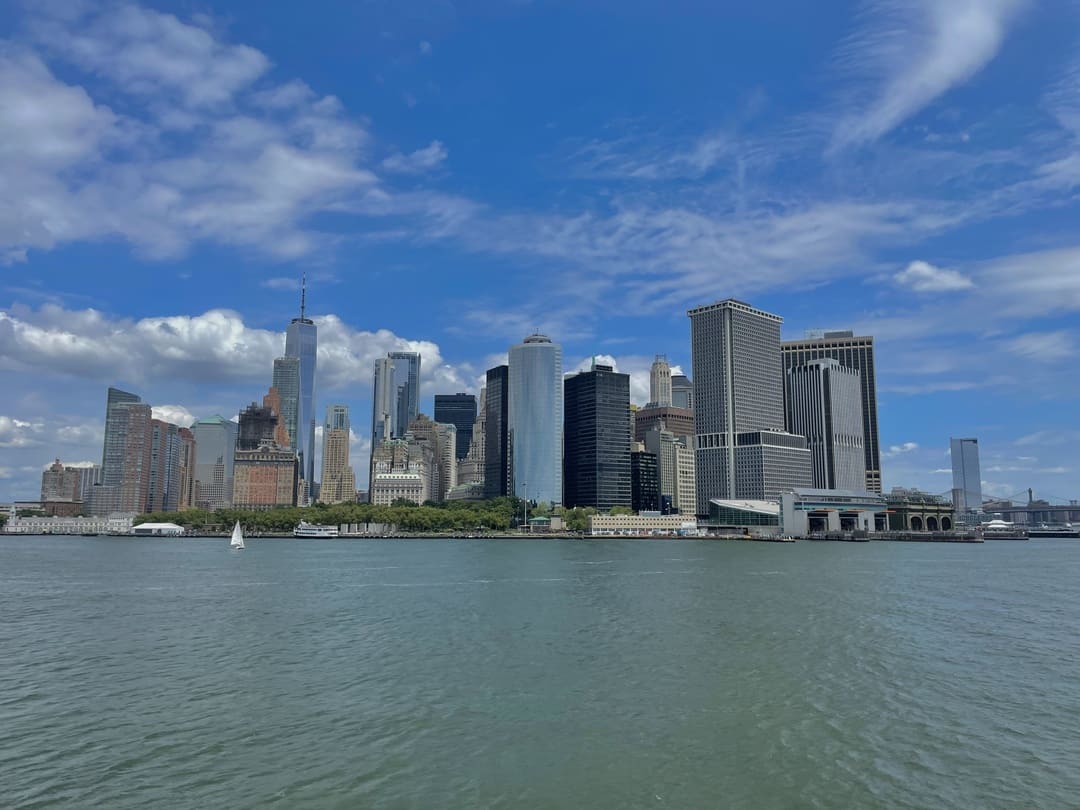 view of manhattan skyline from a ferry, new york