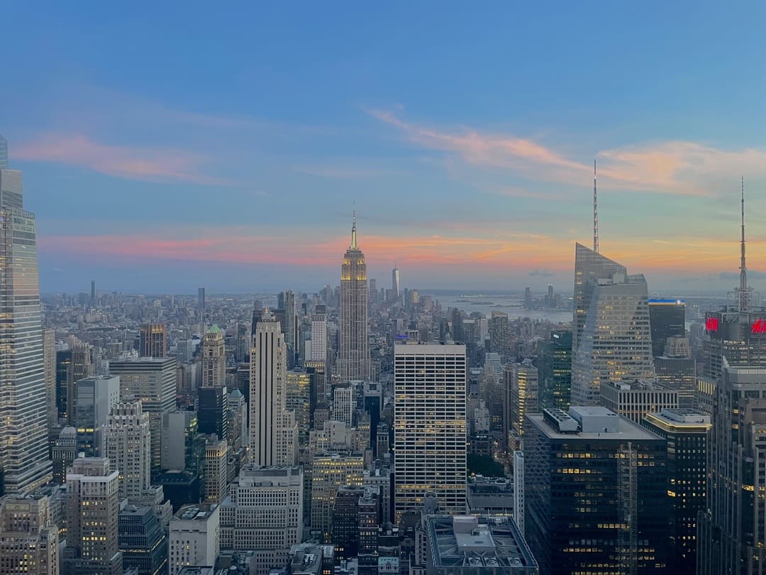 new york skyline from an observation deck at sunset