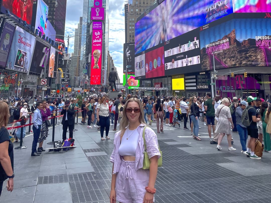 Taya posing in times square, New York