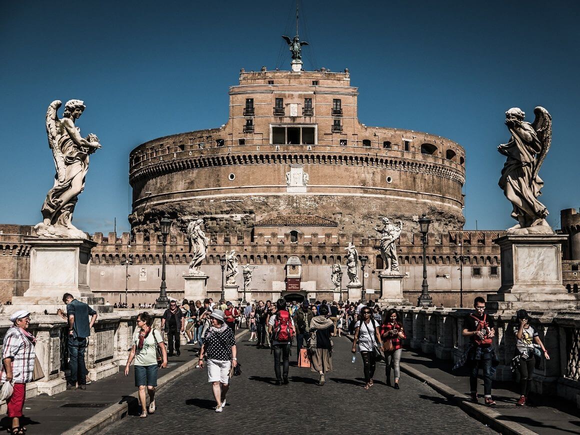 italy rome backpackers and tourists in colosseum