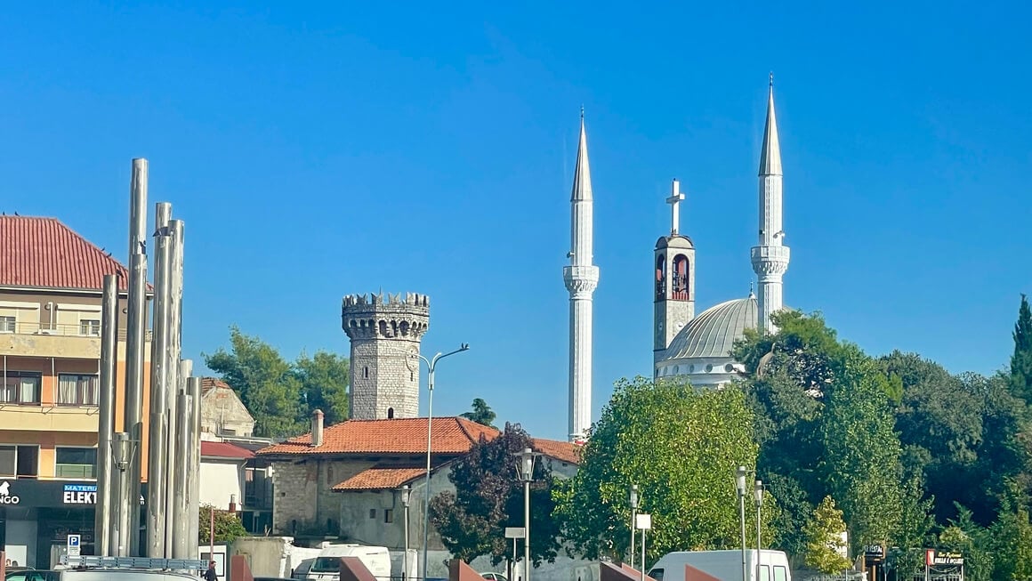 mosque and a church next to each other in albania