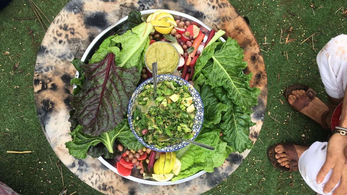 a plate full of veggies and fruits