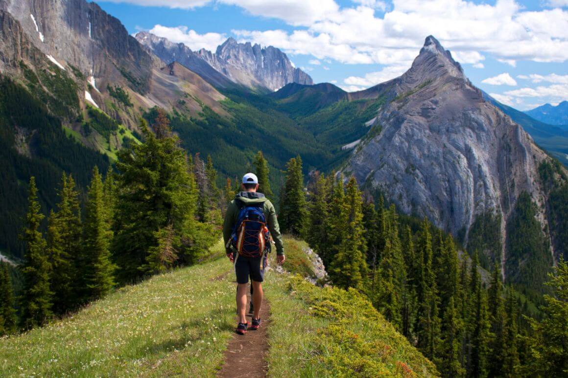 alberta man hiking at creek ridge