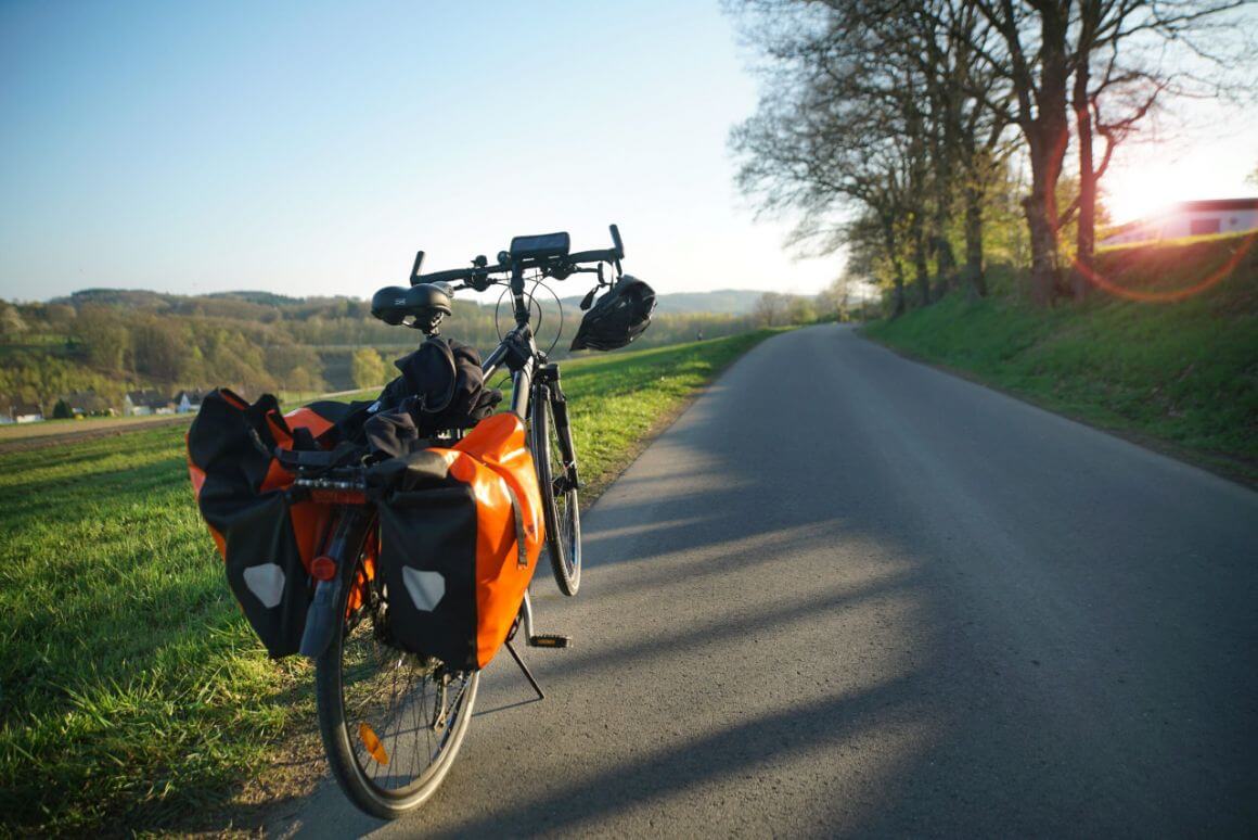 bike with bags parked by the road