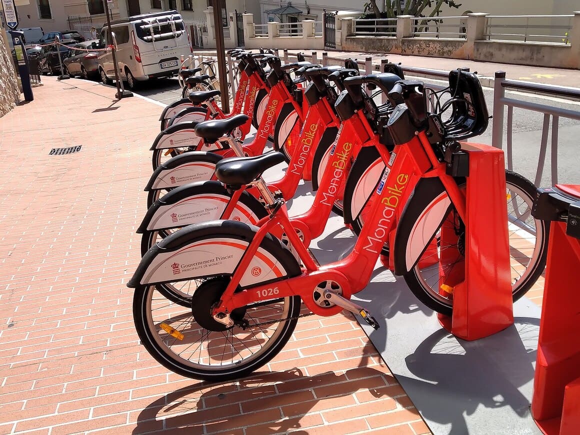 a row of red Mona Ebikes in Monaco