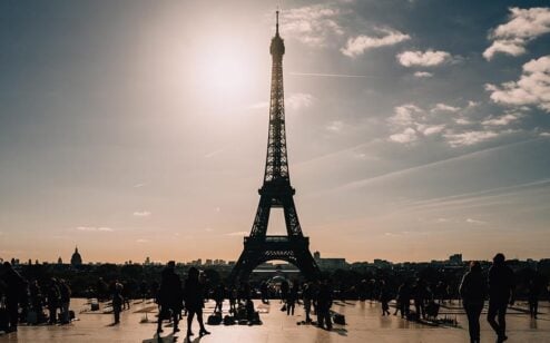 Silhouette of The Eiffel Tower with the sun behind it